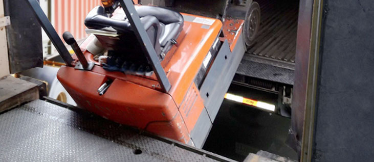 More than a wheel chock, a genuine wheel restraint is required.